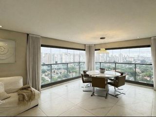 Comprar apartamento mobiliado no Campo Belo com 3 quartos, academia e piscina no condomínio.