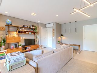 Comprar apartamento mobiliado com 3 quartos.