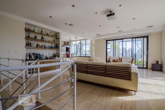 Para comprar: apartamento em Campo Belo com 4 suítes, varanda gourmet, closet e academia no condomínio. — Sala Piso Superior