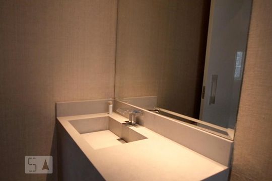 Comprar apartamento mobiliado na Vila Nova Conceição com 2 quartos, varanda e piscina no condomínio. — Lavabo