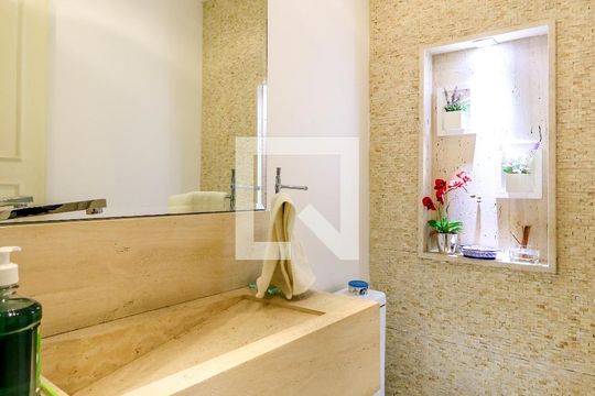 Apartamento mobiliado no Brooklin com 4 suítes e varanda, ideal para comprar. — Lavabo