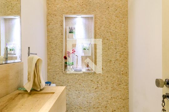 Apartamento mobiliado no Brooklin com 4 suítes e varanda, ideal para comprar. — Lavabo