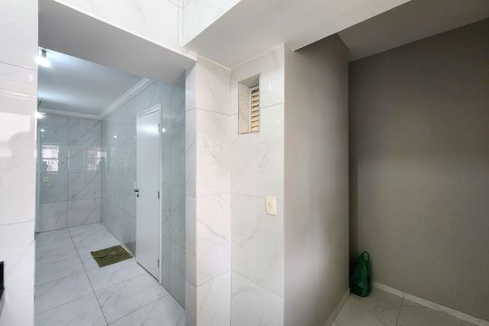 Casa em condomínio para comprar em Indianópolis com 3 suítes e varanda. — Área de Serviço