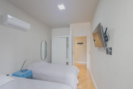 Aluguel: apartamento mobiliado no Jardim Paulista, 2 quartos (1 suíte). — Quarto