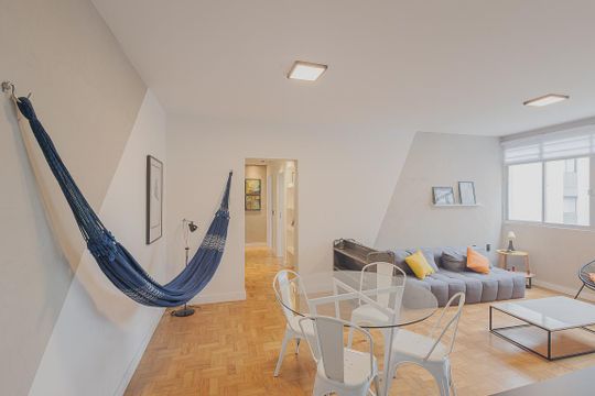 Aluguel: apartamento mobiliado no Jardim Paulista, 2 quartos (1 suíte). — Sala
