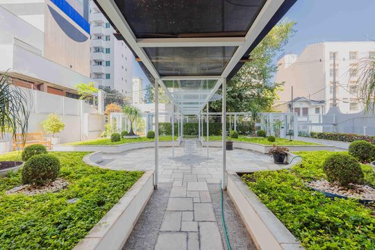 Aluguel: apartamento mobiliado no Jardim Paulista, 2 quartos (1 suíte). — Área comum