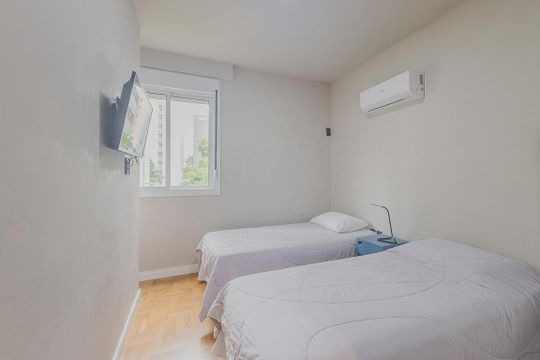 Aluguel: apartamento mobiliado no Jardim Paulista, 2 quartos (1 suíte). — Quarto