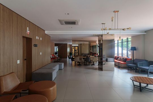 Comprar apartamento na Vila Olímpia com 2 suítes e piscina no condomínio. — Área comum - Salão de festas