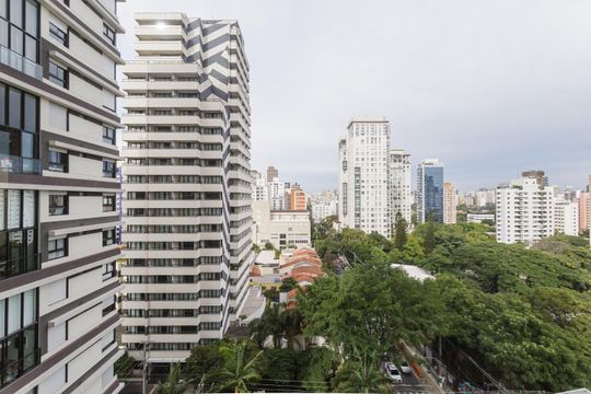 Comprar apartamento na Vila Olímpia com 2 suítes e piscina no condomínio. — Vista