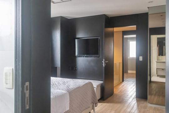 Compra apartamento mobiliado em Vila Olímpia, 3 quartos, varanda, piscina e academia no condomínio. — Quarto Suíte