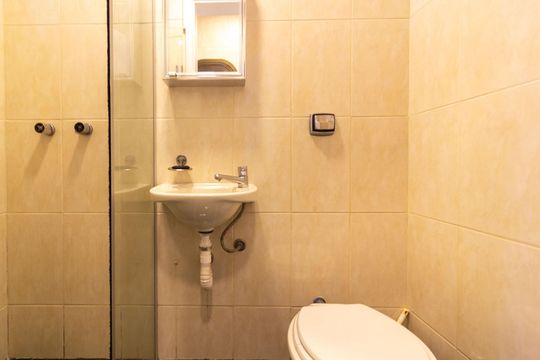 Venda de apartamento em Campo Belo com 4 suítes e varanda. — Banheiro de Serviço