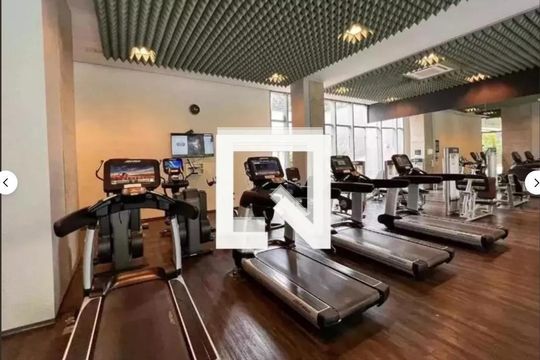 Comprar apartamento mobiliado na Vila Nova Conceição com 2 suítes, varanda gourmet e piscina no condomínio. — Academia
