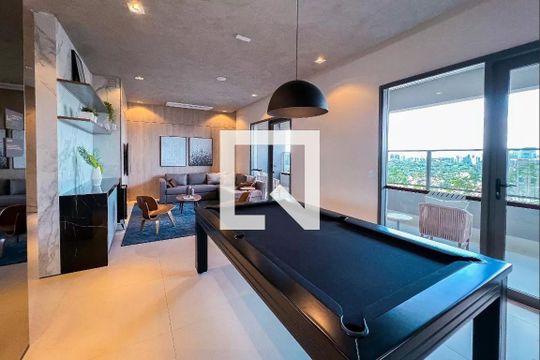 Venda de apartamento mobiliado com 2 quartos, varanda gourmet, quintal, academia e piscina no condomínio. — Salão de jogos